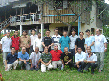 All the 20 Jesuits working in Cambodia; behind them is the Jesuits’ and volunteers’ residence at the Banteay Prieb.