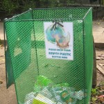 Mesh bin designated for empty plastic bottles.