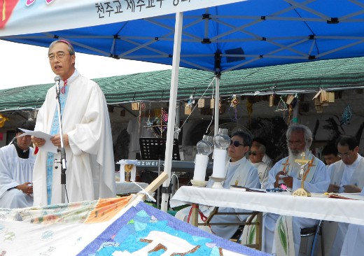 Bishop Peter Kang, the local bishop, giving a sermon at Mass at Gangjeong Village, Jeju.