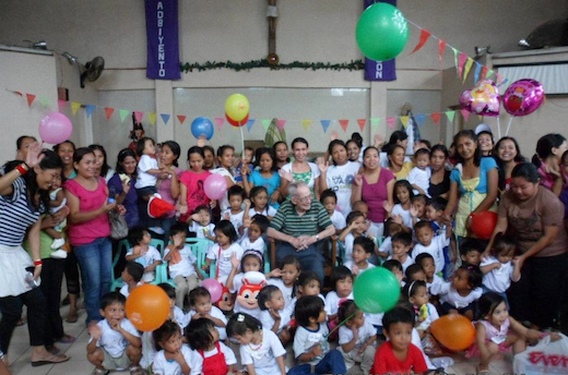 Fr Jack Carroll at feeding programme Christmas party in 2011