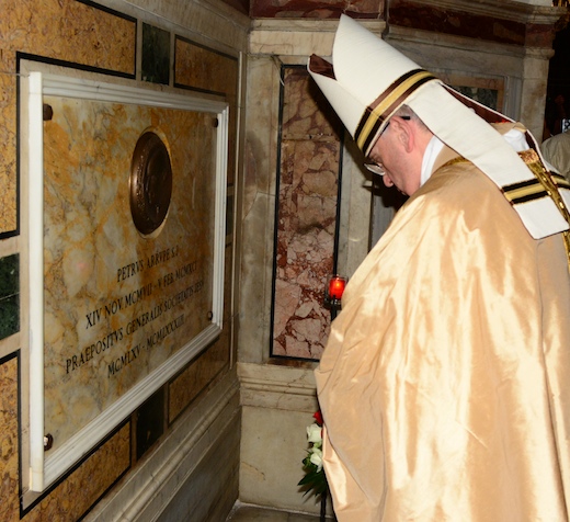 Pope Francis prays at the tomb of Pedro Arrupe SJ