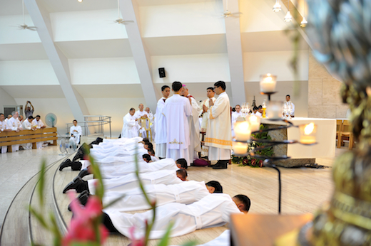 Prostrate during the singing of the Litany, imploring our Lord and the saints.