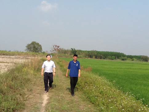 Fr Daniel Huang SJ (L), General Counsellor and Regional Assistant for Asia Pacific, visits the land with Fr Peter Pichet Saengthien SJ (R).