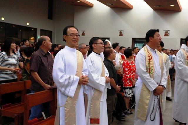 Brothers Gregory (L) and Matthew (R) Tan SJ before their priestly ordination