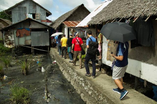 Visiting communities in Tacloban City, Leyte (2015 SBC Workshop)
