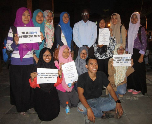 Students and lecturers of comparative religious studies and Islamic theology at the Islamic State University Sunan Ampel Surabaya, with Syamsulah and Hussain, refugees from Afghanistan housed in Surabaya Immigration detention centre. 