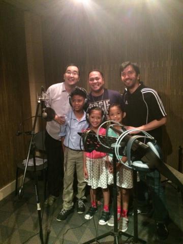 Composers Soo Young Theodore Park SJ and Jun-G Bargayo SJ with arranger Gino Torres and the child singers